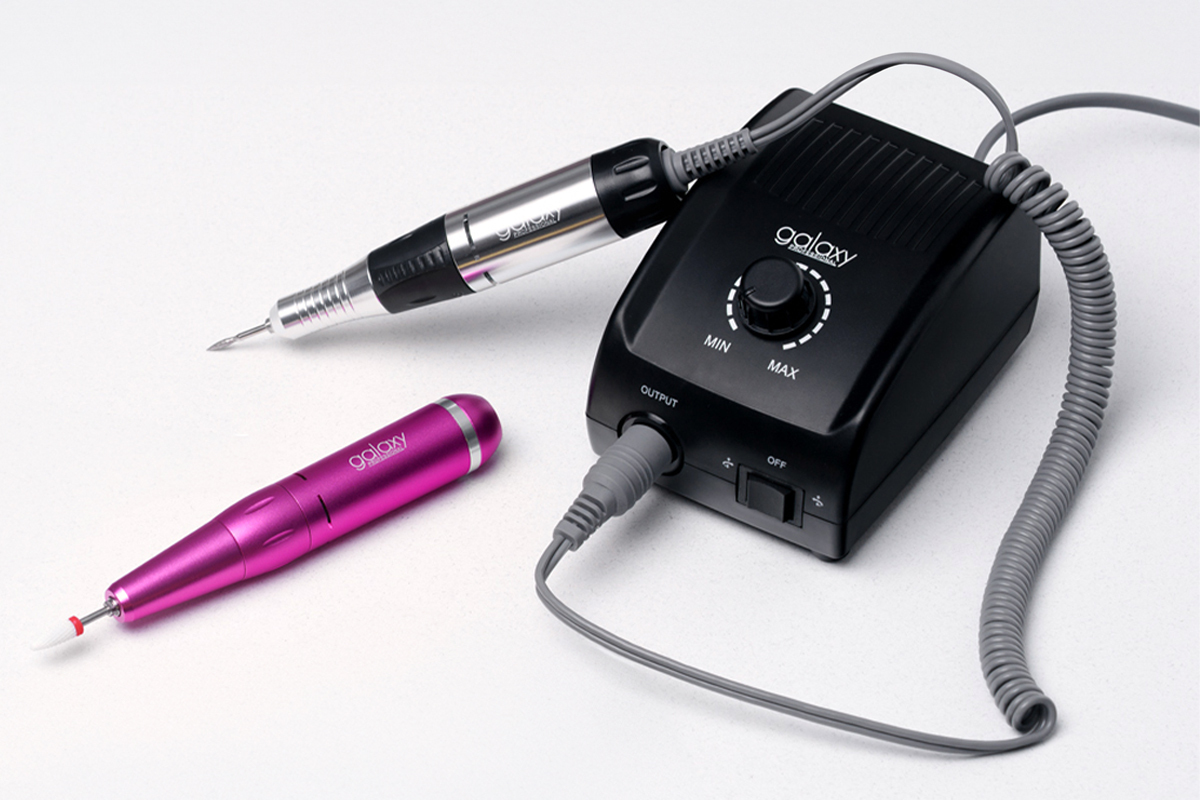 Professional electric nail drill with ergonomic design and forward/reverse rotation